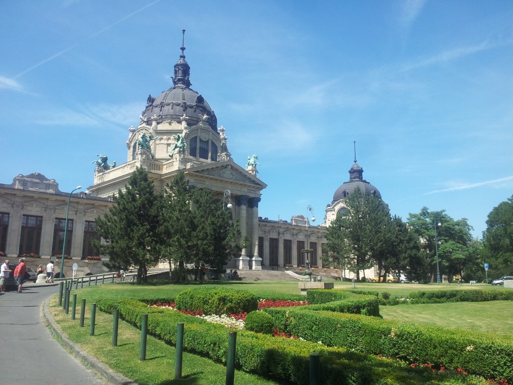 The grand entrance, the baroque dome, and the garden